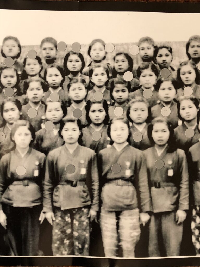 Young Rumiko Tamaki (second row, third from the left) with her fellow Himeyuri nurses. The dots may have been placed on the photo digitally to identify the students. (Photo provided by Janice Suetomi)