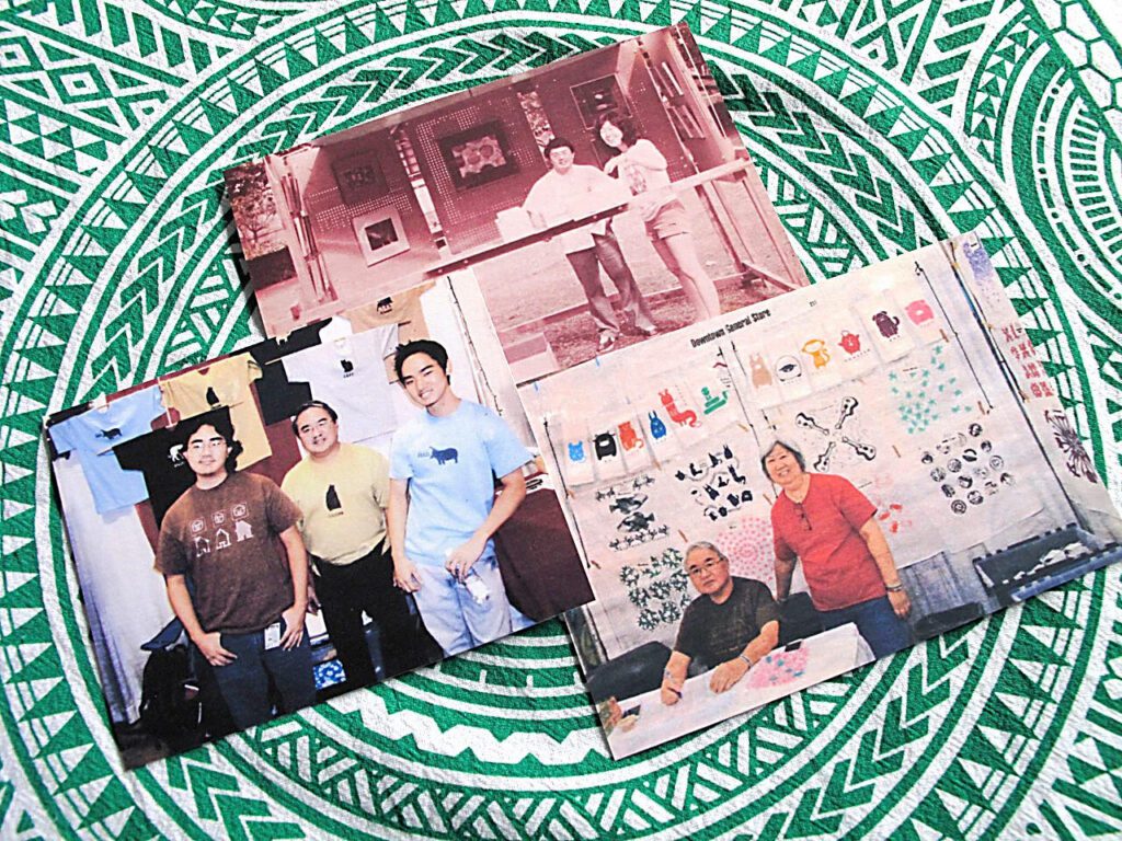 First craft fair selling photos and cards. Later adding t-shirts by Les and sons Sky and Cody. Now back to just Les & Penny selling flour sack towels. -Hachimaki Tapa Towel