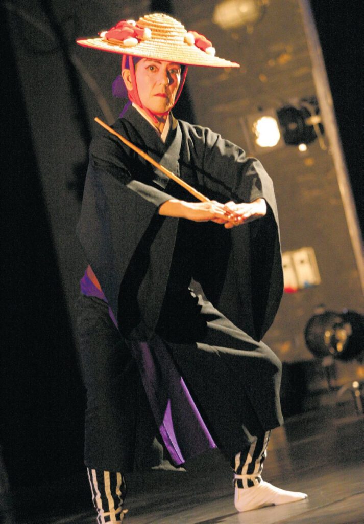 Shiroma donned a traditional kimono for her performance in “Manzai,” a classical male dance from a kumi wudui (Okinawan dance drama) about two brothers avenging their father’s death. Photo taken at the Malaysian Dance Festival in Kuala Lumpur (2005).