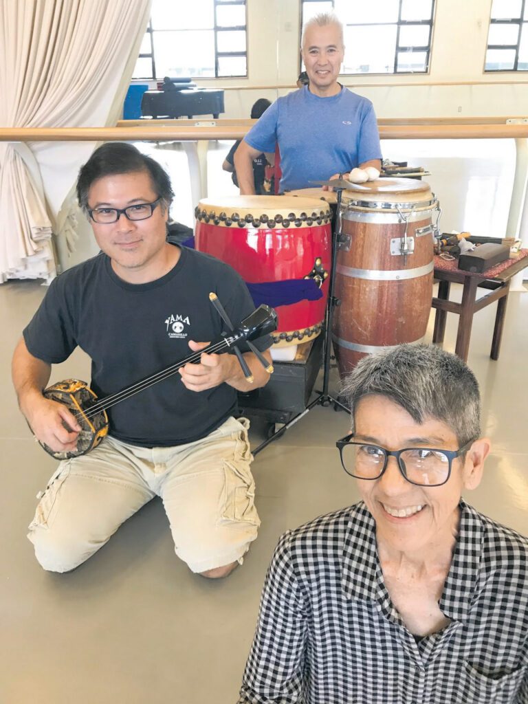 Shiroma (foreground, right) and “Imaginary Homelands” collaborators Kenny Endo (background) and Norman Kaneshiro (midground, left) during a 2020 rehearsal for their 2021 show at Leeward Theatre (and/or virtual streaming).