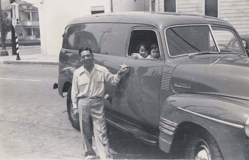 Kazuo Kojima with his children Sachi and Satoshi in truck. Courtesy of Kojima Family Photo Album